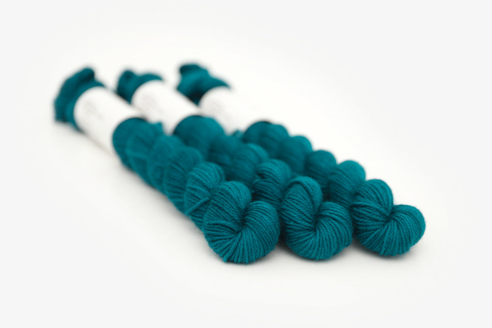 semisolid hand dyed blue green teal phyllis sock mini yarn