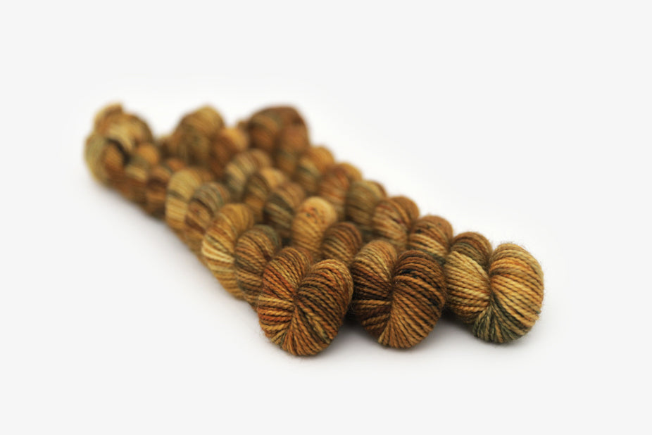 speckled hand dyed brown burnt orange olive merino sock mini yarn
