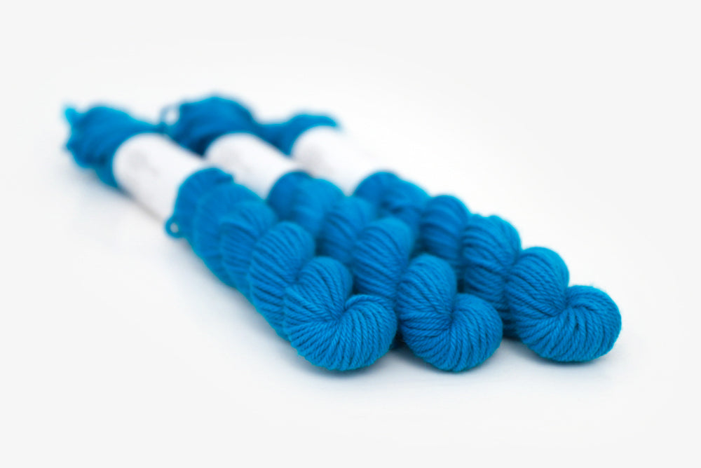 semisolid hand dyed cerulean (bright aqua blue) dk mini yarn 