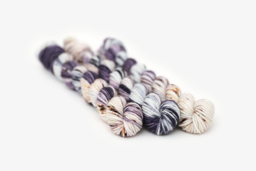 speckled hand dyed dark purple lilac white dk mini yarn