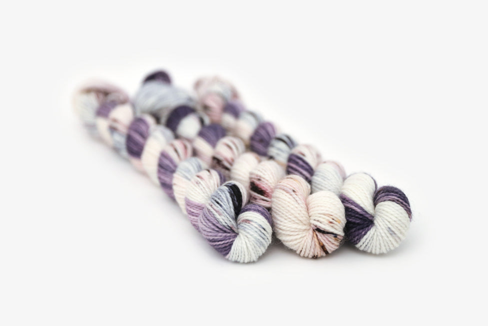 speckled hand dyed dark purple lilac white merino sock mini yarn