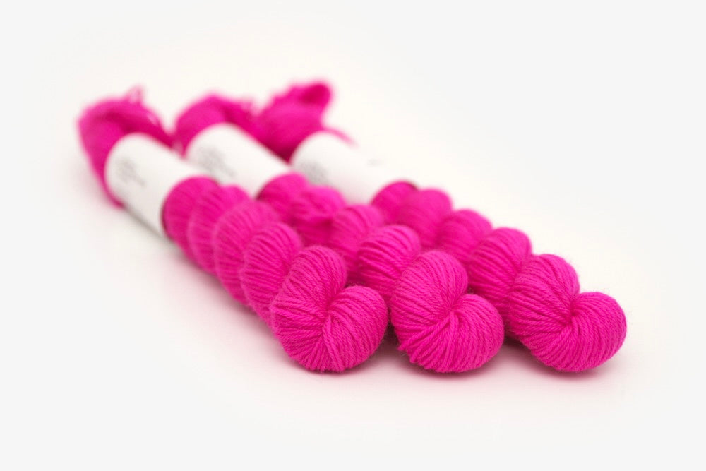 semisolid hand dyed fuchsia (bright hot pink) phyllis sock mini yarn