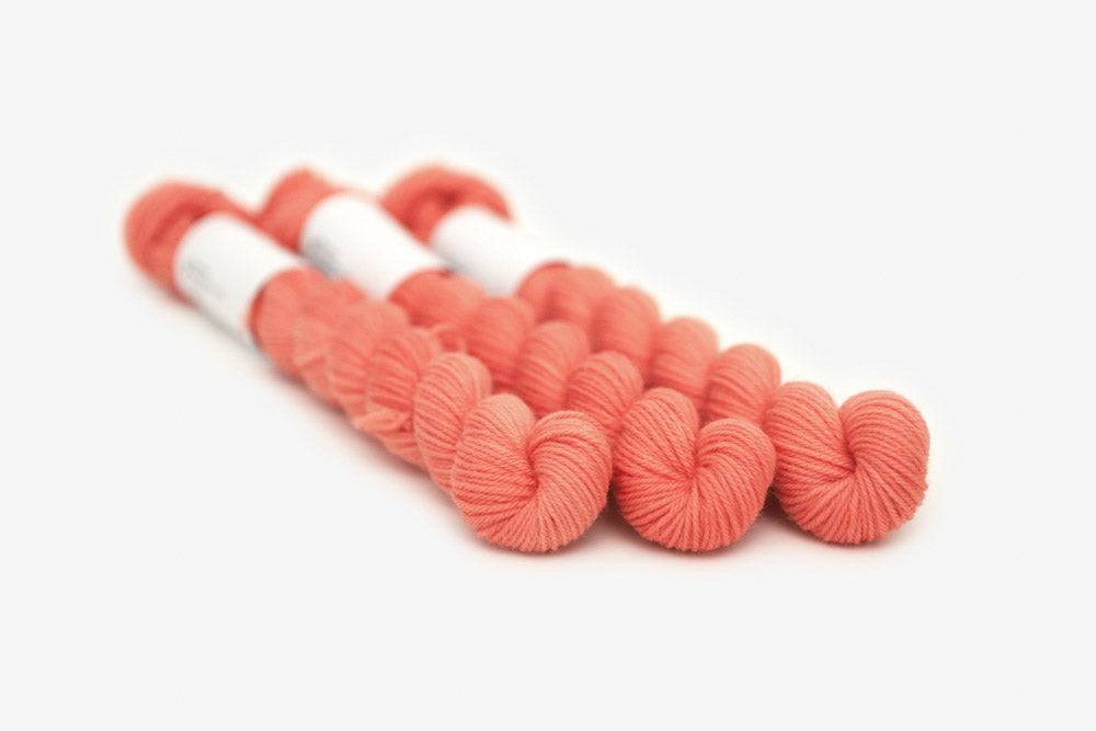 semisolid hand dyed coral pink orange phyllis sock mini yarn
