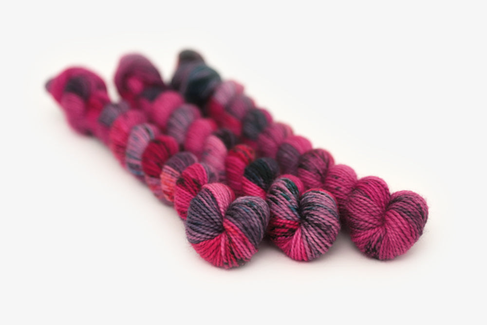 speckled hand dyed hot pink purple aqua merino sock mini yarn