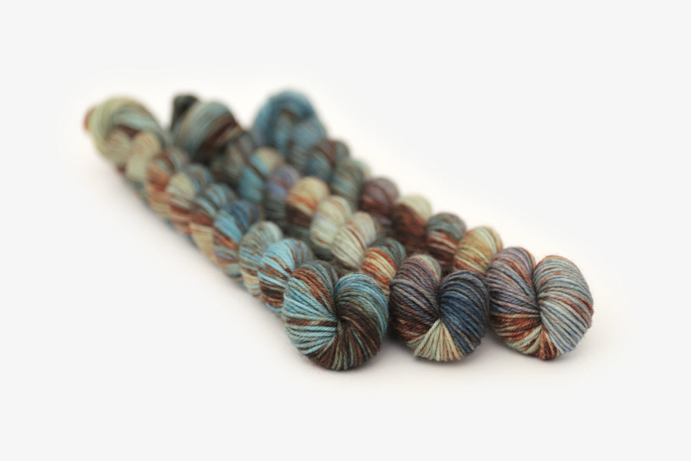 speckled hand dyed blue rust orange sage phyllis sock mini yarn