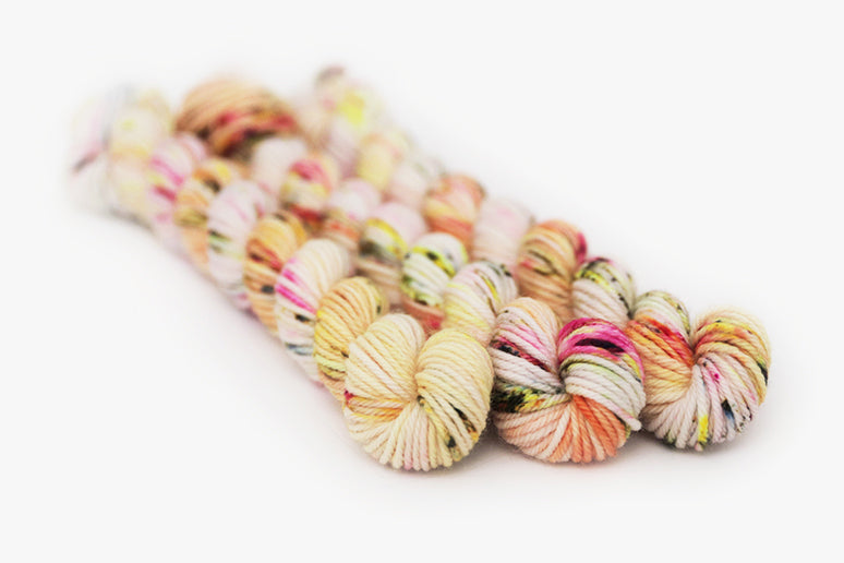 speckled hand dyed pink white neon yellow orange dk mini yarn