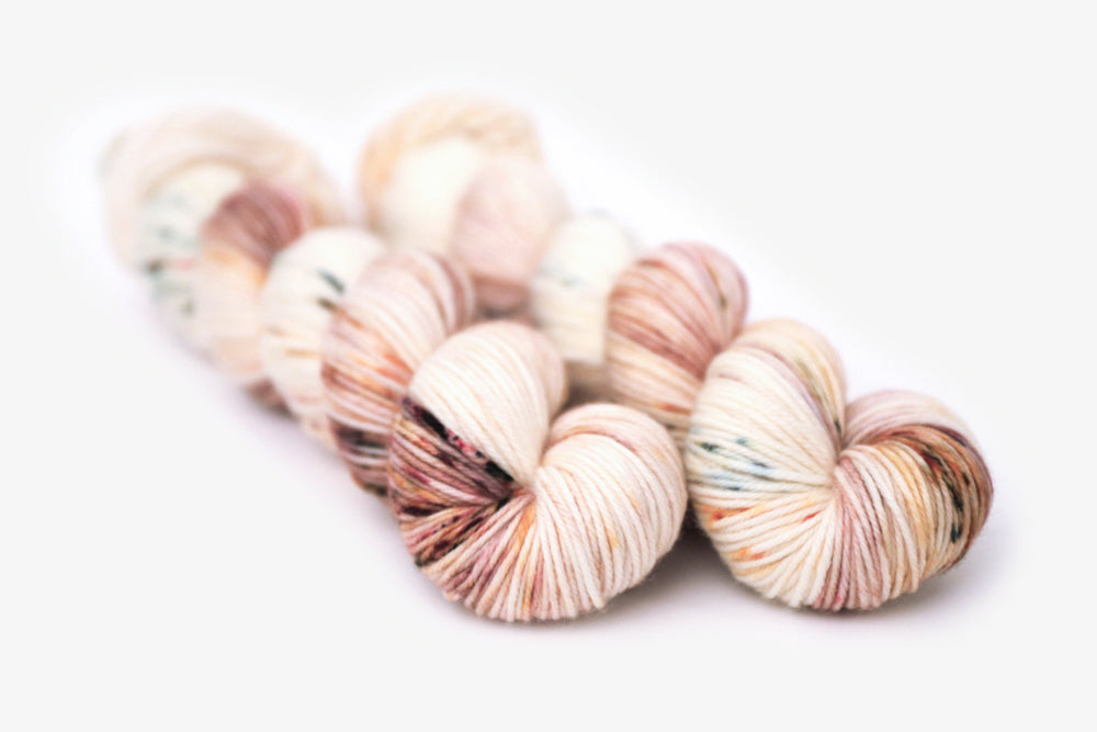 speckled hand dyed white pink mauve maroon dk yarn