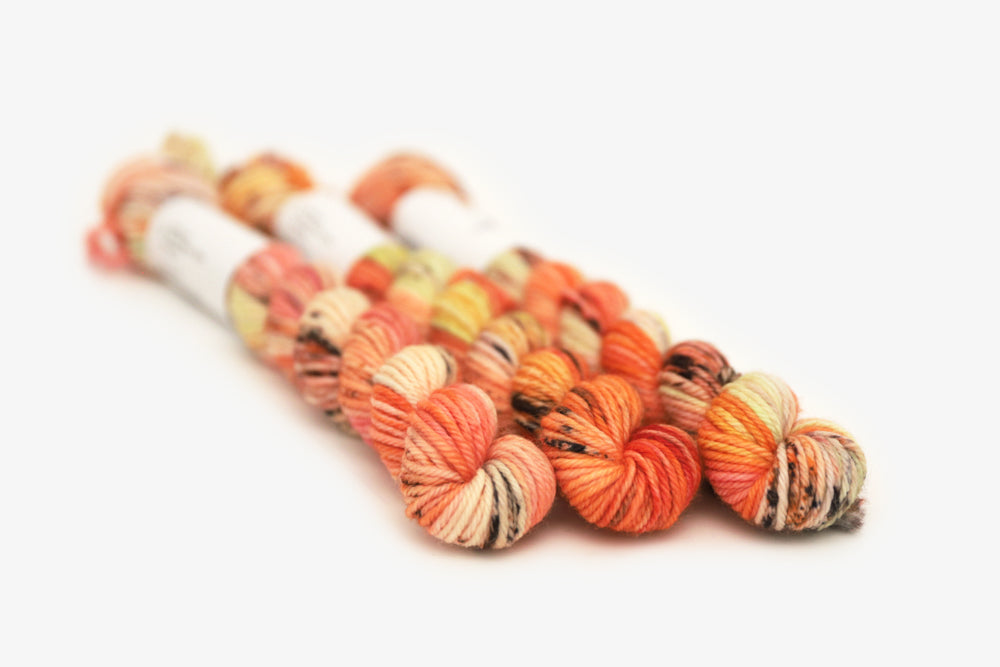 speckled hand dyed bright orange coral pink dk mini yarn