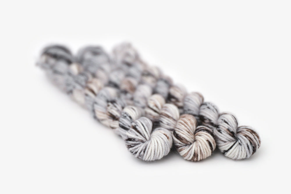 speckled hand dyed cool white gray brown dk mini yarn
