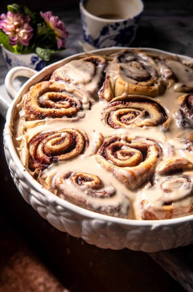 cinnamon rolls in white ceramic dish 