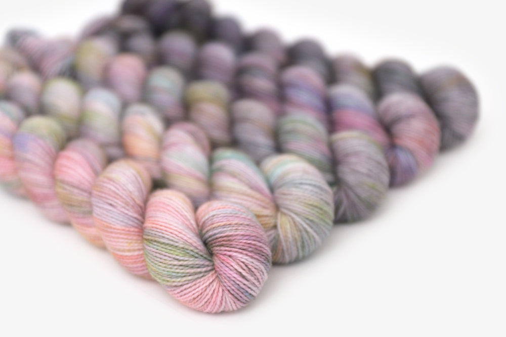 tonal hand dyed gray plum peach green blue yarn 50s set