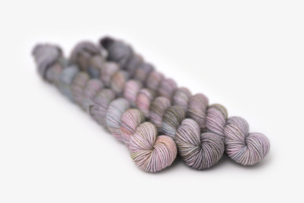 tonal hand dyed gray plum peach green blue phyllis sock mini yarn