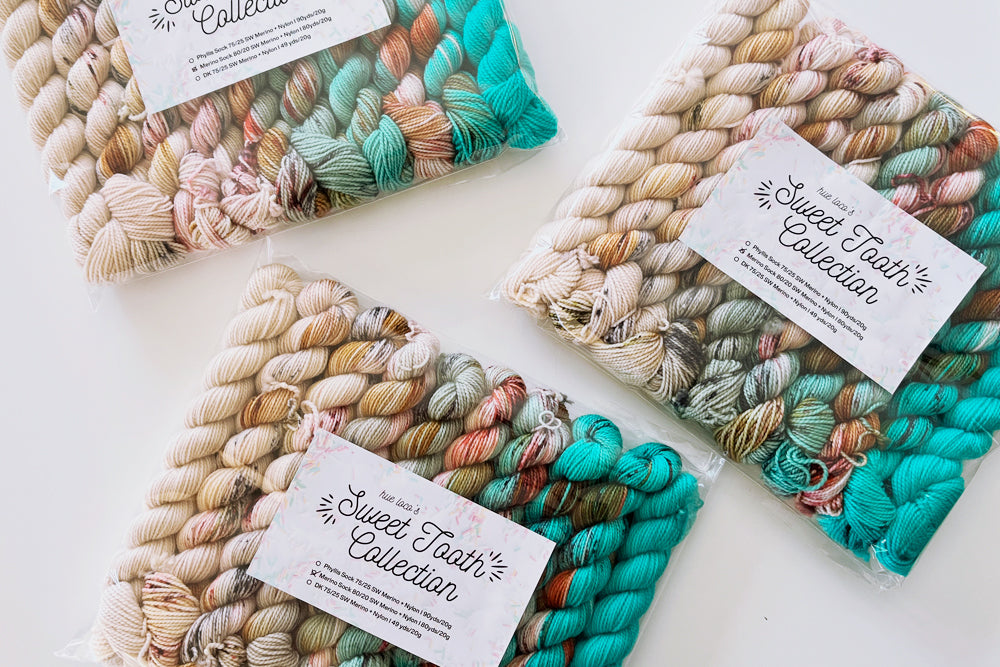speckled semisolid hand dyed tan teal aqua red yarn set
