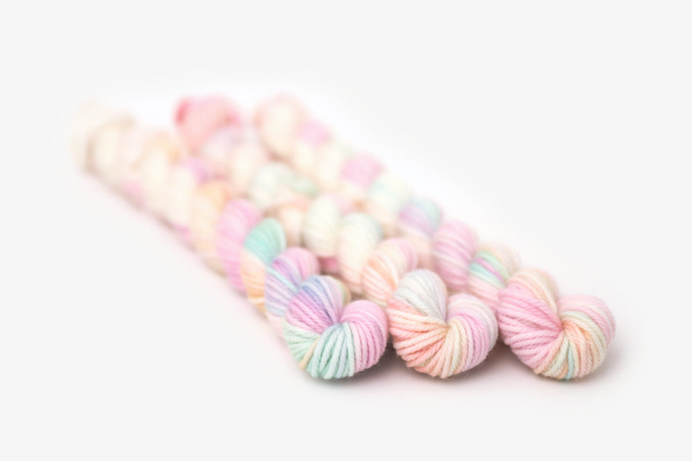 tonal hand dyed white pink plum peach green dk mini yarn