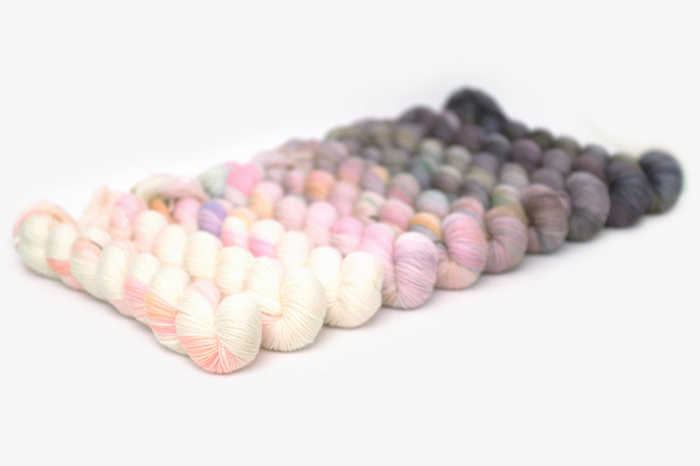 tonal hand dyed white pink gray plum peach green blue yarn 50s set