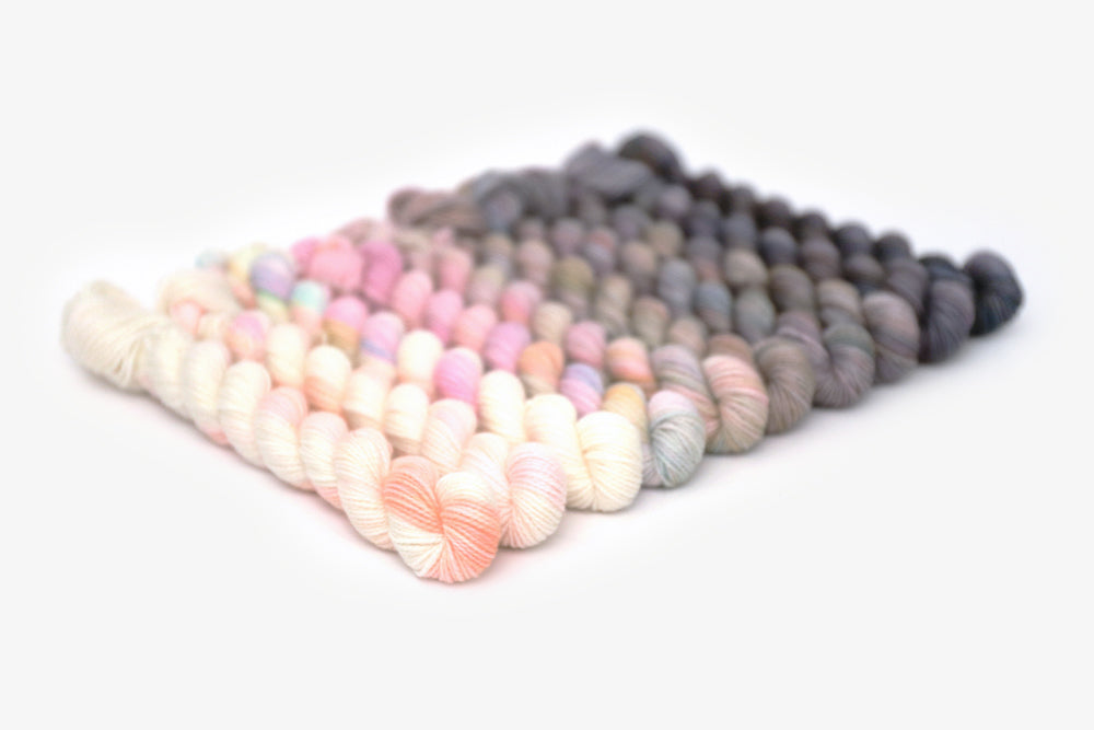 tonal hand dyed white pink gray plum peach green blue yarn mini set