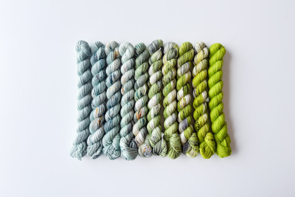 speckled semisolid hand dyed light blue lime green gray yarn set