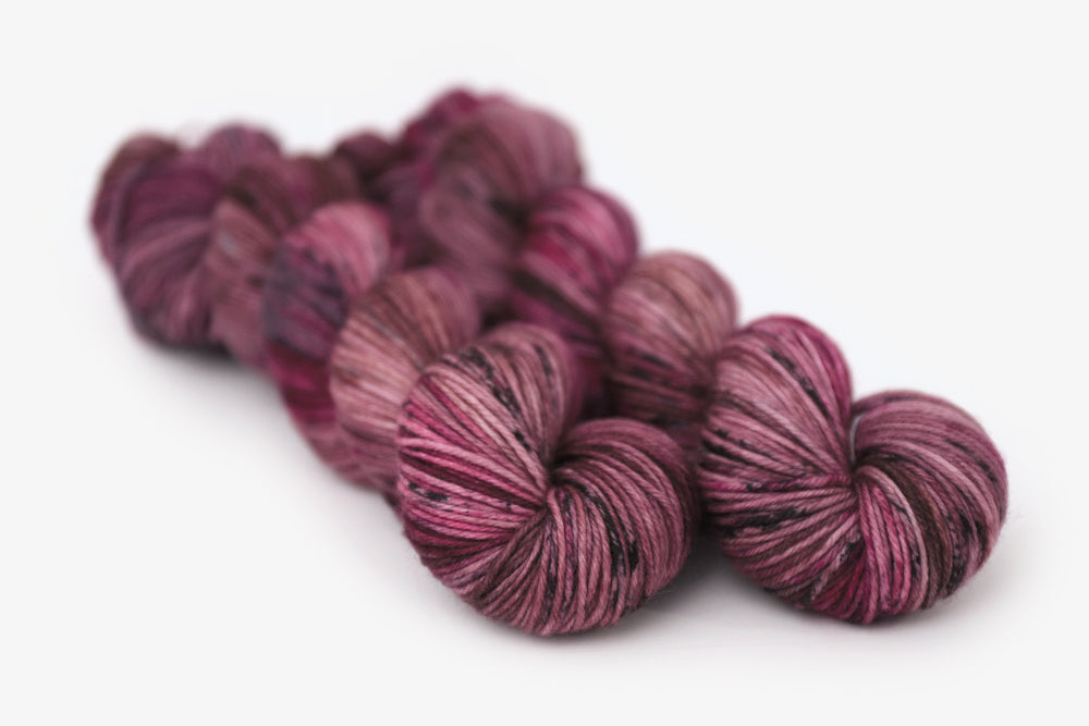 speckled hand dyed white pink dark mauve maroon dk yarn