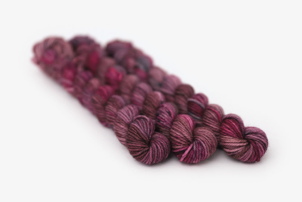 speckled hand dyed white pink dark mauve maroon dk mini yarn