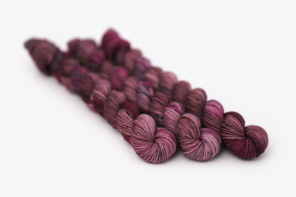 speckled hand dyed white pink dark mauve maroon phyllis sock mini yarn