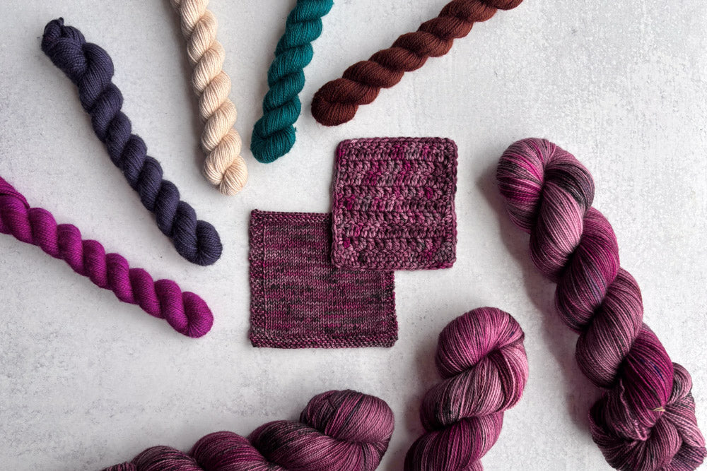 speckled hand dyed dark pink mauve brown yarn swatches
