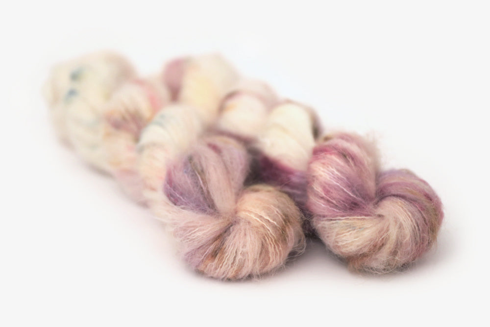 speckled hand dyed white pink mauve alpaca suri lace yarn