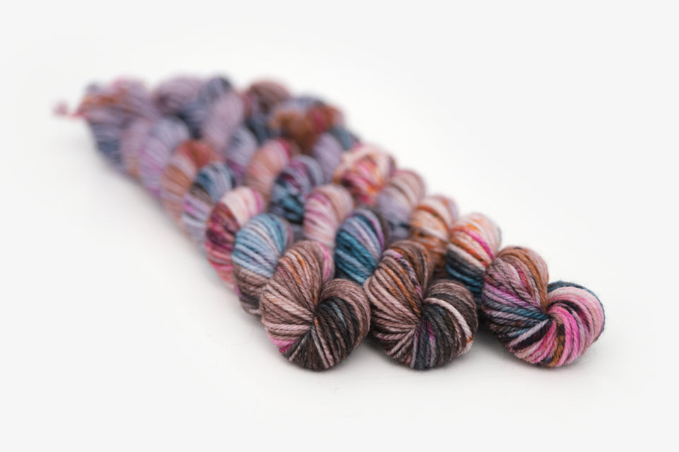speckled hand dyed lilac teal magenta brown dk mini yarn