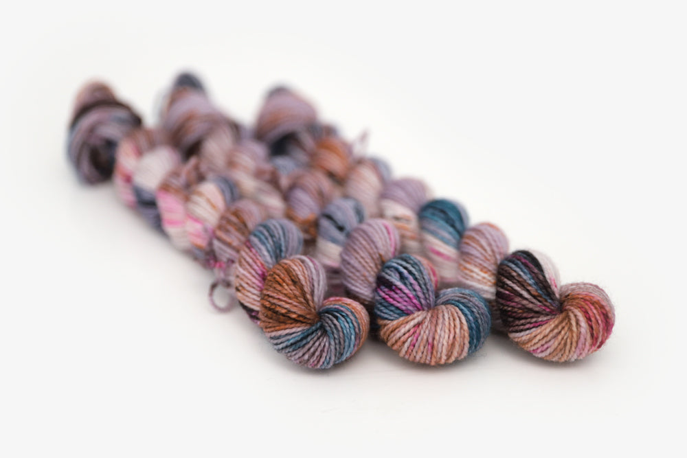 speckled hand dyed lilac teal magenta brown merino sock mini yarn