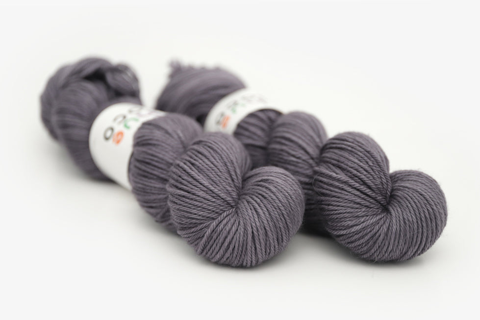 semisolid hand dyed charcoal (dark silver gray) worsted yarn