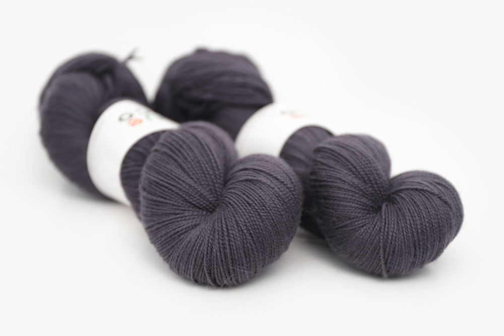 semisolid hand dyed dark gray black merino sock yarn