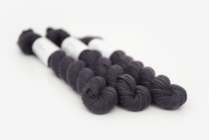 semisolid hand dyed dark gray black merino sock mini yarn