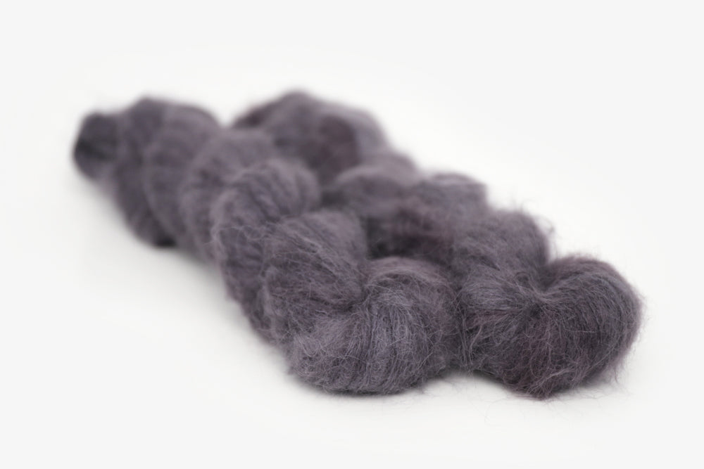 semisolid hand dyed dark gray black alpaca suri lace yarn
