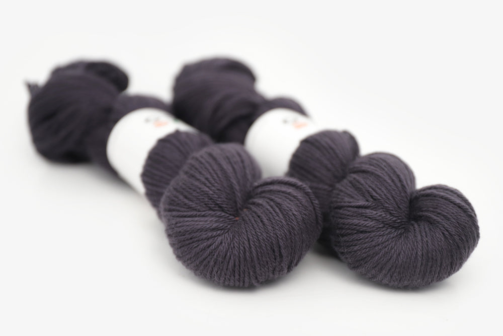 semisolid hand dyed dark gray black worsted yarn