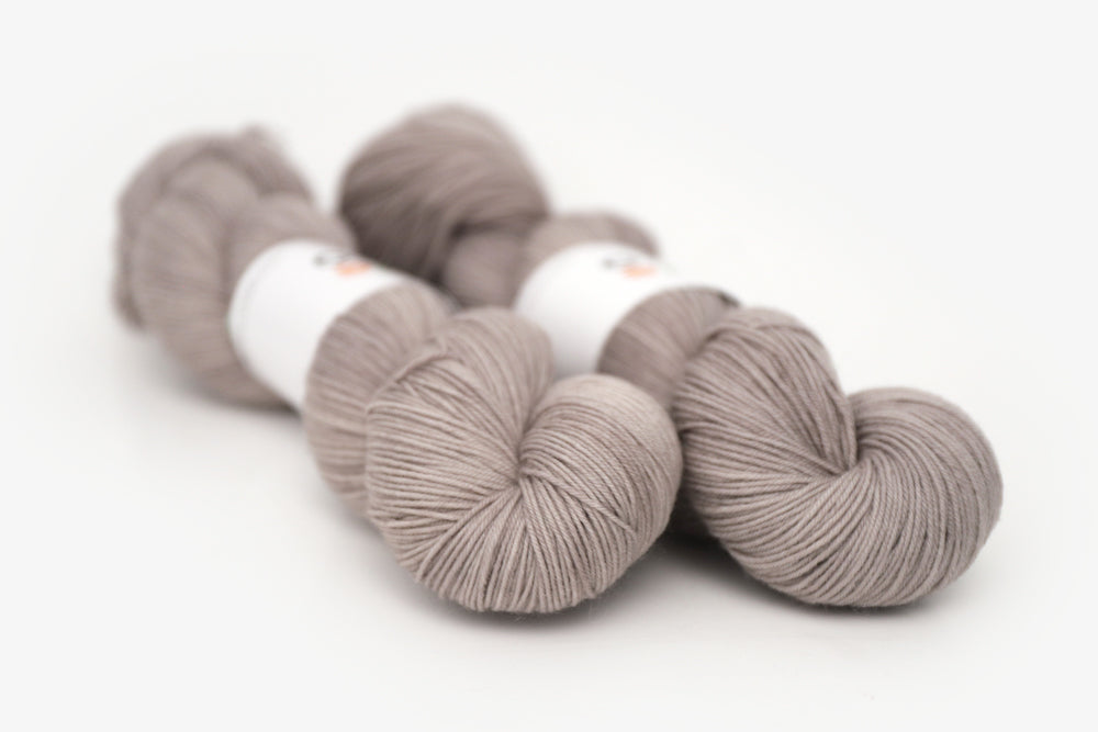 semisolid hand dyed warm greige gray phyllis sock yarn