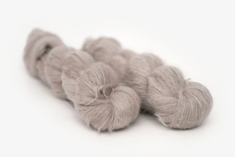 semisolid hand dyed warm greige gray alpaca suri lace yarn