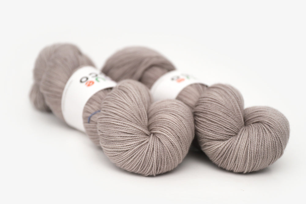 semisolid hand dyed warm greige gray spun xl yarn