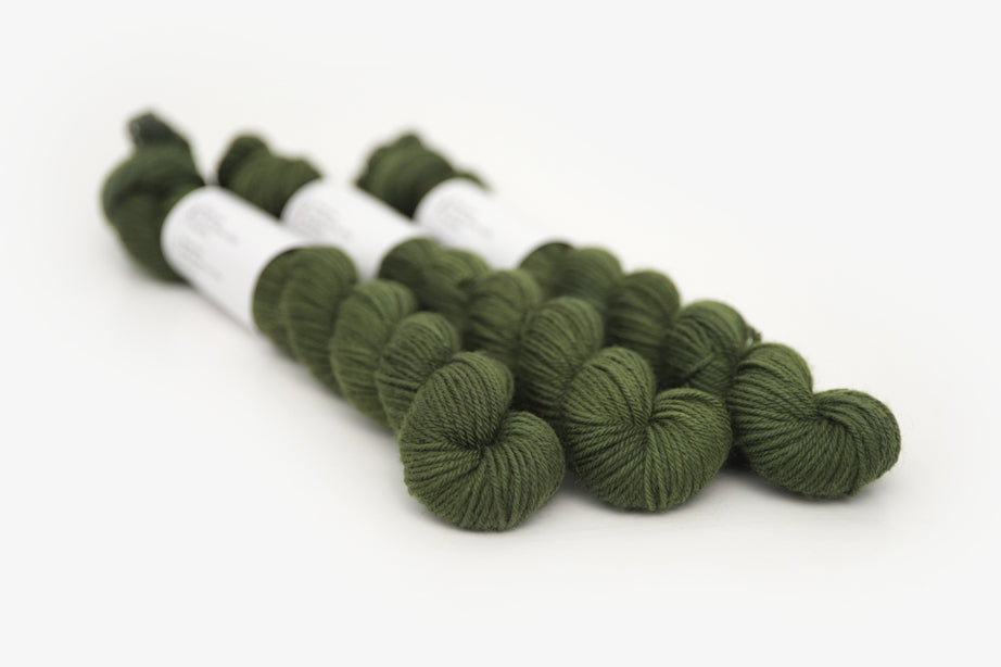 semisolid hand dyed dark forest green phyllis sock mini yarn