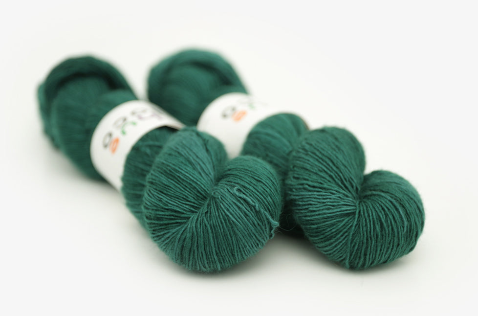 semisolid hand dyed emerald (dark blue green) single sock yarn