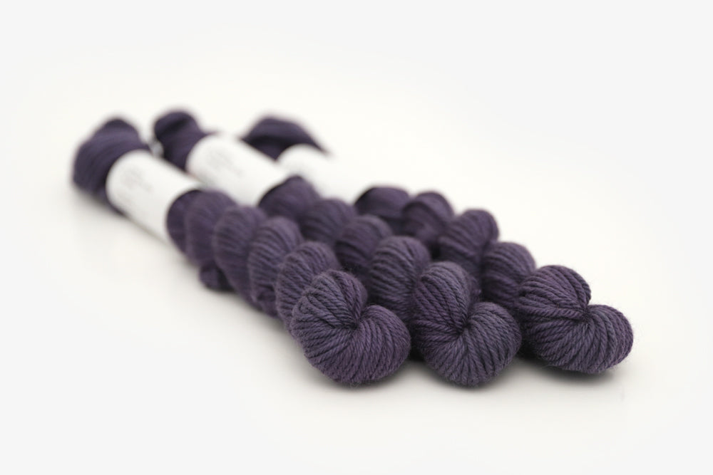 semisolid hand dyed juniper (dark navy purple blue) dk mini yarn
