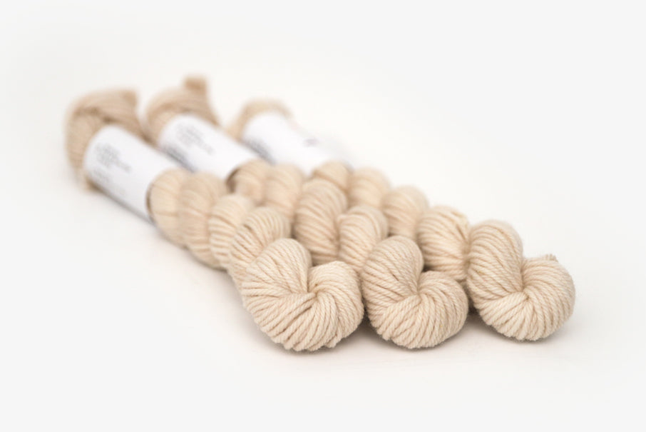 semisolid hand dyed light beige tan dk mini yarn