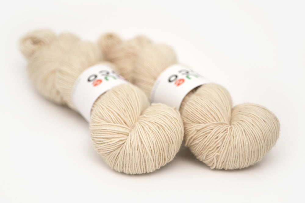 semisolid hand dyed light beige tan single sock yarn