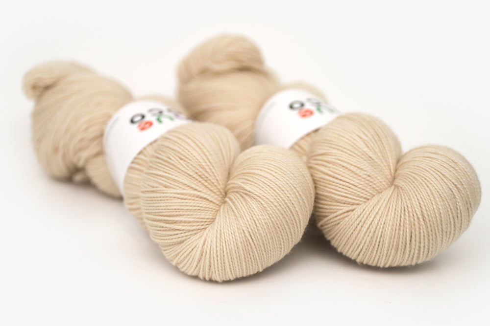 semisolid hand dyed light beige tan spun xl yarn