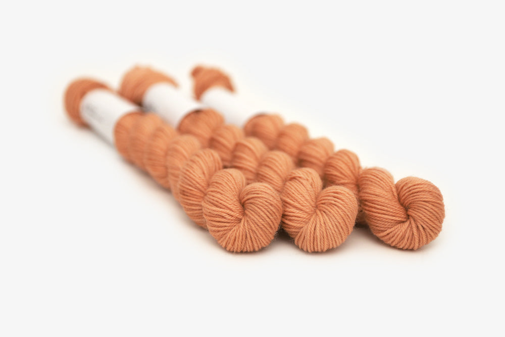 semisolid hand dyed nectarine (peach salmon orange) phyllis sock mini yarn