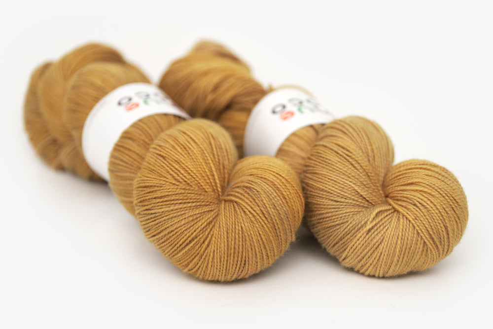 semisolid hand dyed ochre (dark bronze yellow) spun xl yarn