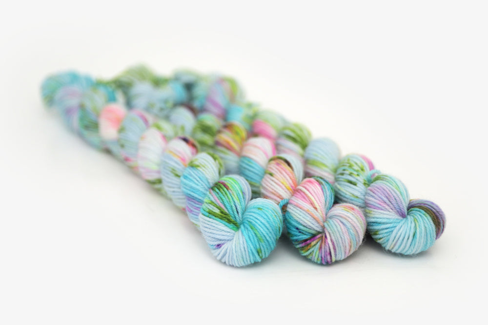 speckled hand dyed bright aqua green purple phyllis sock mini yarn