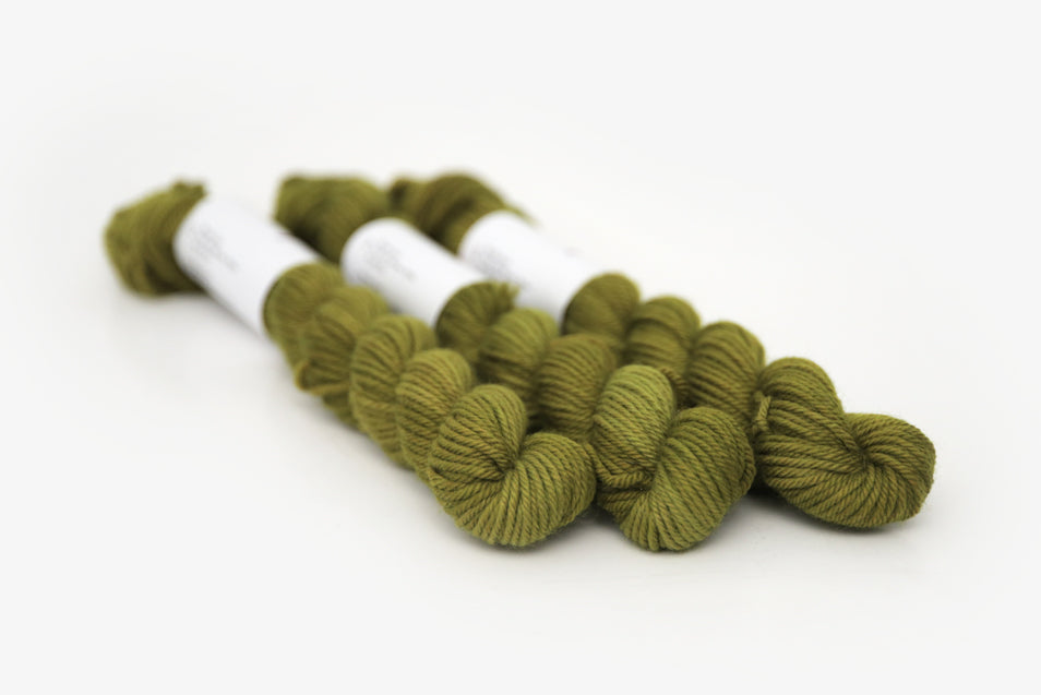 semisolid hand dyed pear (dark olive yellow green) dk mini yarn