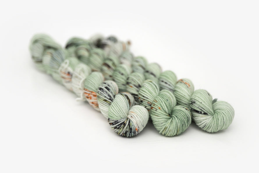 speckled hand dyed pale green sage peach phyllis sock mini yarn
