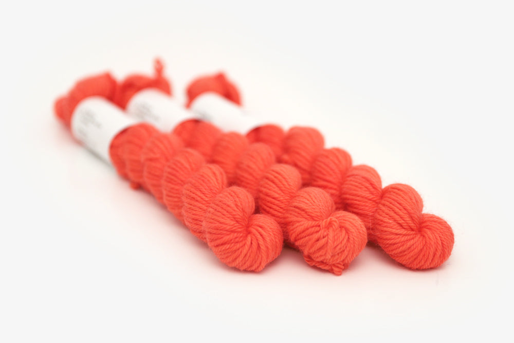 semisolid hand dyed poppy (bright orange red) dk mini yarn