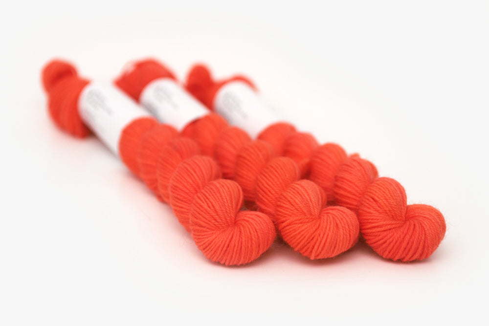semisolid hand dyed poppy (bright orange red) phyllis sock mini yarn