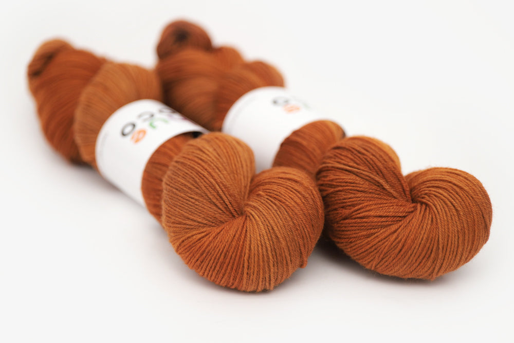 semisolid hand dyed pumpkin (dark burnt orange) phyllis sock yarn